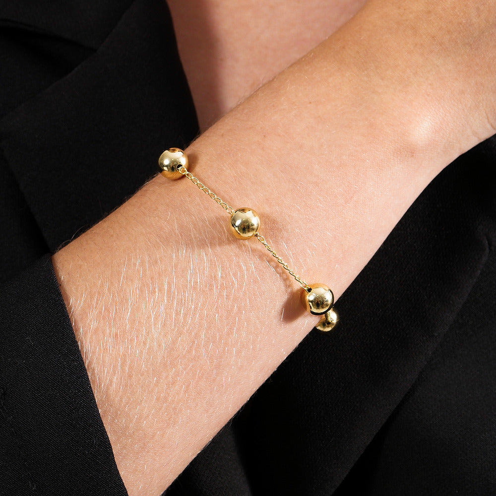Pulseira Dourada de Bolas Grandes - Galeria